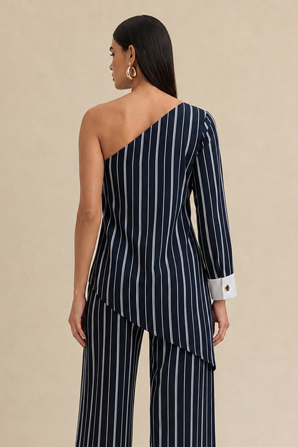 Blusa Listrada Manga Única Com Punho